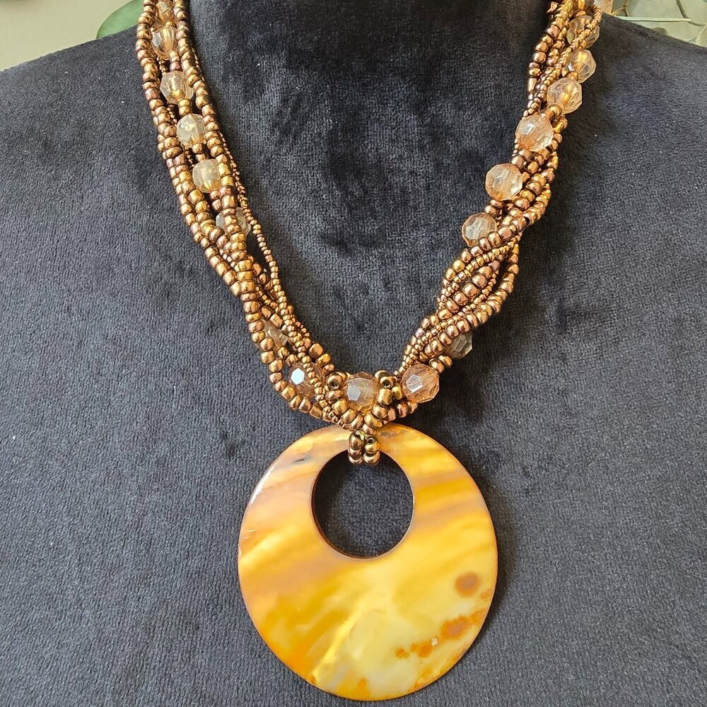 Womens Gold Tone Seed Beaded Amaterasu Pendant Necklace with Lobster Clasp